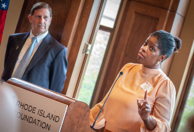 Womazetta Jones, right, the new Secretary of the R.I. Executive Office of Health and Human Services, speaking at a reception to welcome her on Thursday morning, Aug. 22, at the Rhode Island Foundation, with Neil Steinberg, president and CEO of the Rhode Island Foundation.